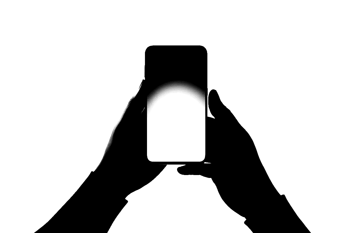 Two hands holding a lit phone